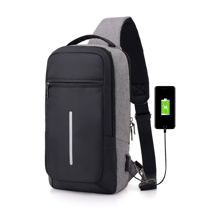 "Man wearing a sleek dark gray anti-theft USB charging chest bag — travel-friendly, lightweight, and stylish everyday carry bag available at Lynda Kay’s Shop."