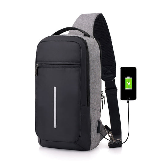 "Man wearing a sleek dark gray anti-theft USB charging chest bag — travel-friendly, lightweight, and stylish everyday carry bag available at Lynda Kay’s Shop."
