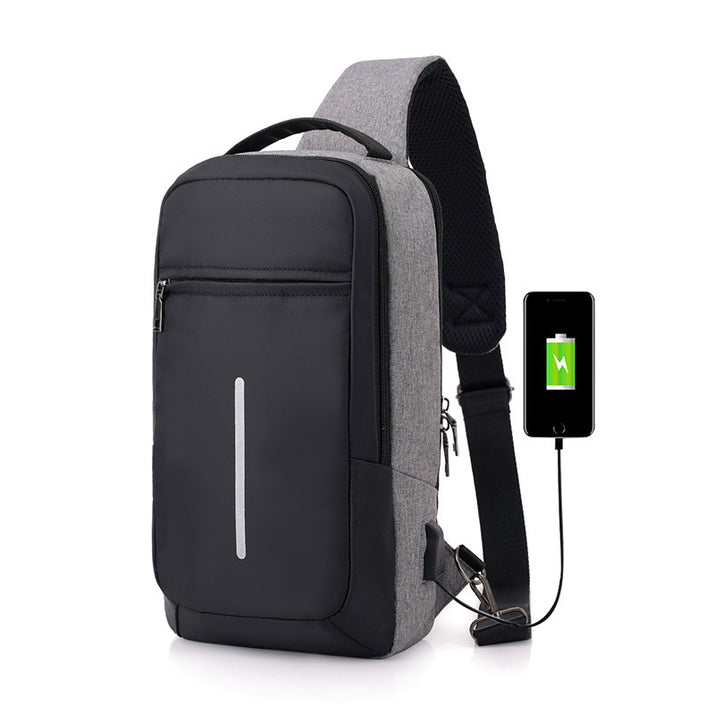 "Man wearing a sleek dark gray anti-theft USB charging chest bag — travel-friendly, lightweight, and stylish everyday carry bag available at Lynda Kay’s Shop."