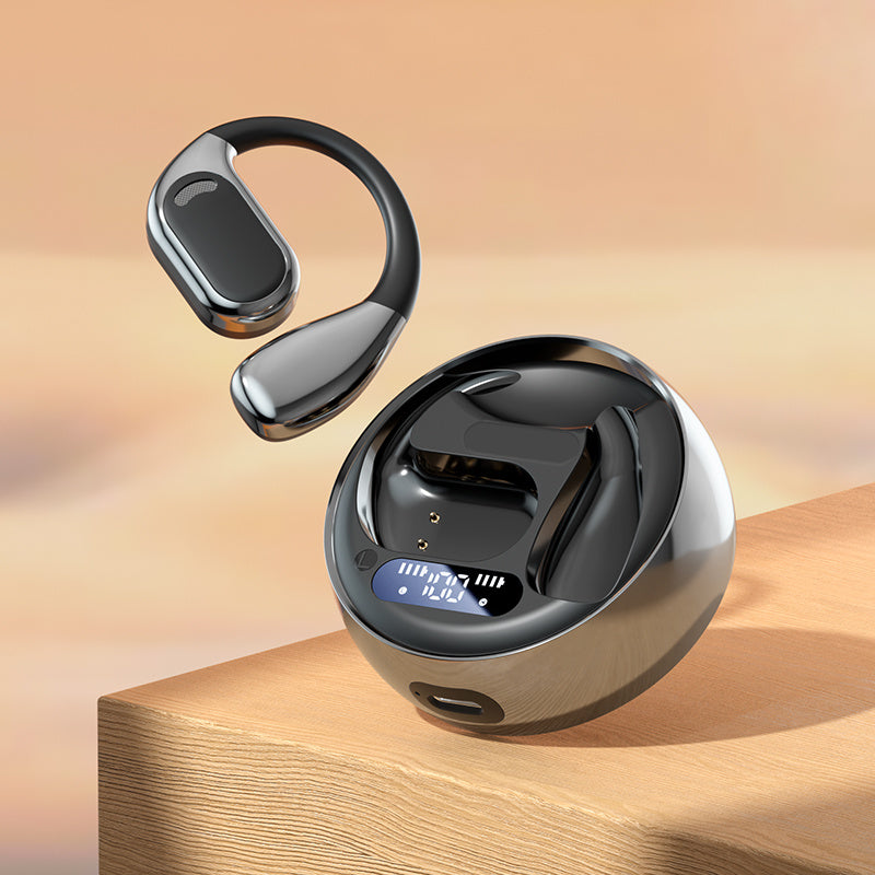 Wireless earbuds with charging case on a wooden surface