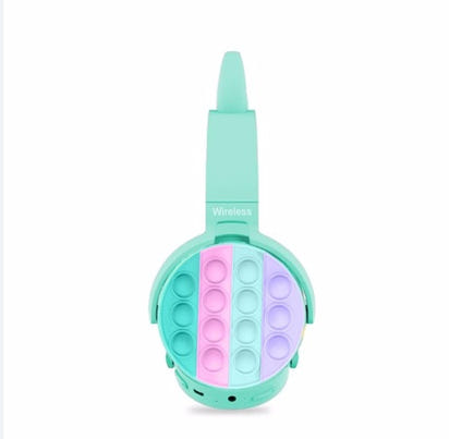 Turquoise wireless cat-ear headphones with pop-it fidgets ear pads for kids.
