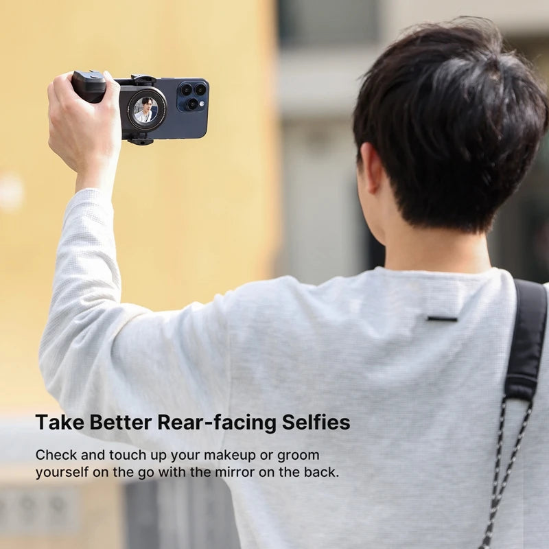 “Bluetooth shutter button on MagSafe camera grip being pressed for remote photos.”