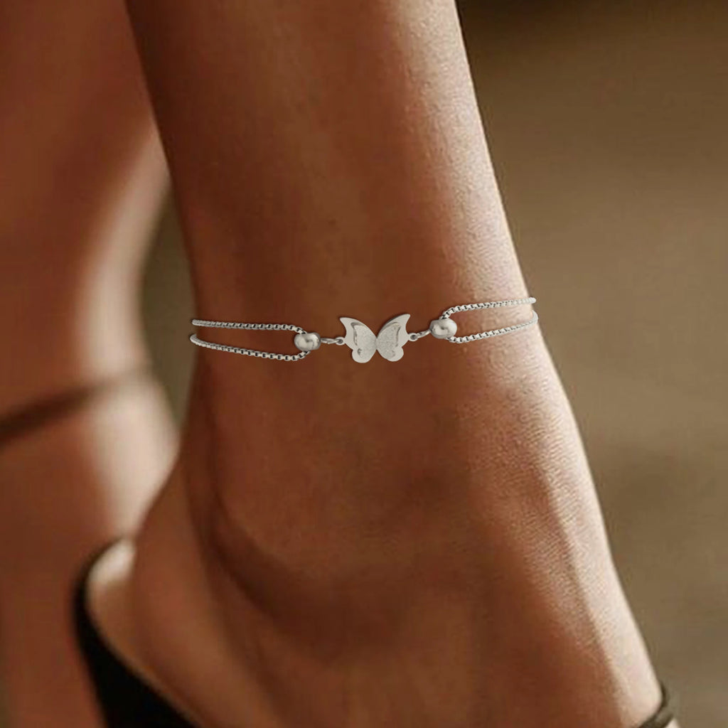 Frosted butterfly anklet in gold and silver tones