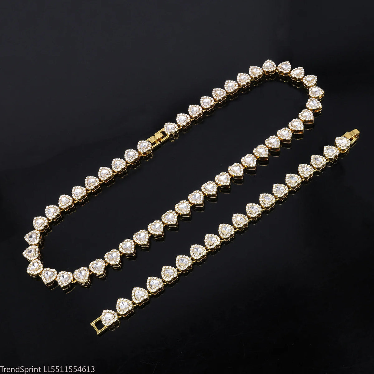 Gold-tone heart rhinestone necklace laid lengthwise