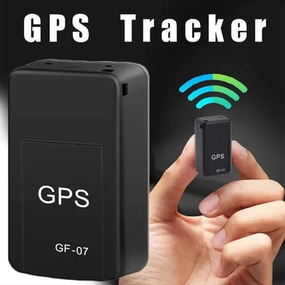 GPS tracker with a hand holding a smaller GPS device on a black background