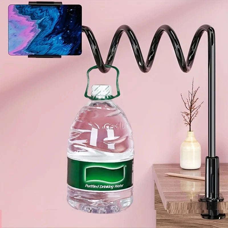 Bottle with a flexible black holder on a pink background