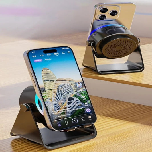Smartphone on a stand with a cityscape display, next to a smartphone on a stand with a speaker.