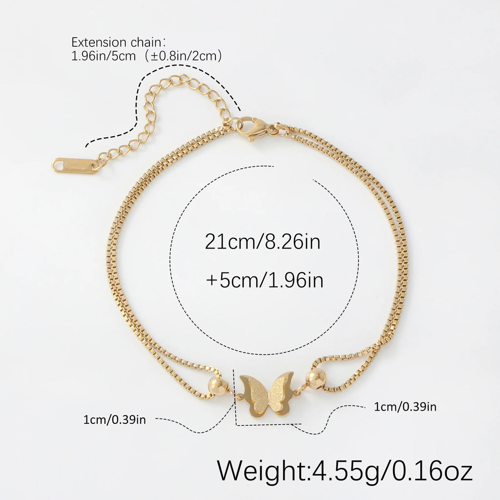 Frosted butterfly anklet in gold and silver tones