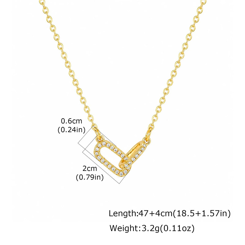 Gold interlocking heart paperclip necklace with clear zircon accents