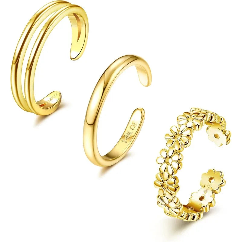 Floral design photo:
Three gold-plated adjustable toe ring styles featuring smooth and floral open-band designs.