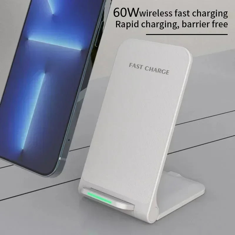 White wireless charging stand with smartphone on a light gray surface