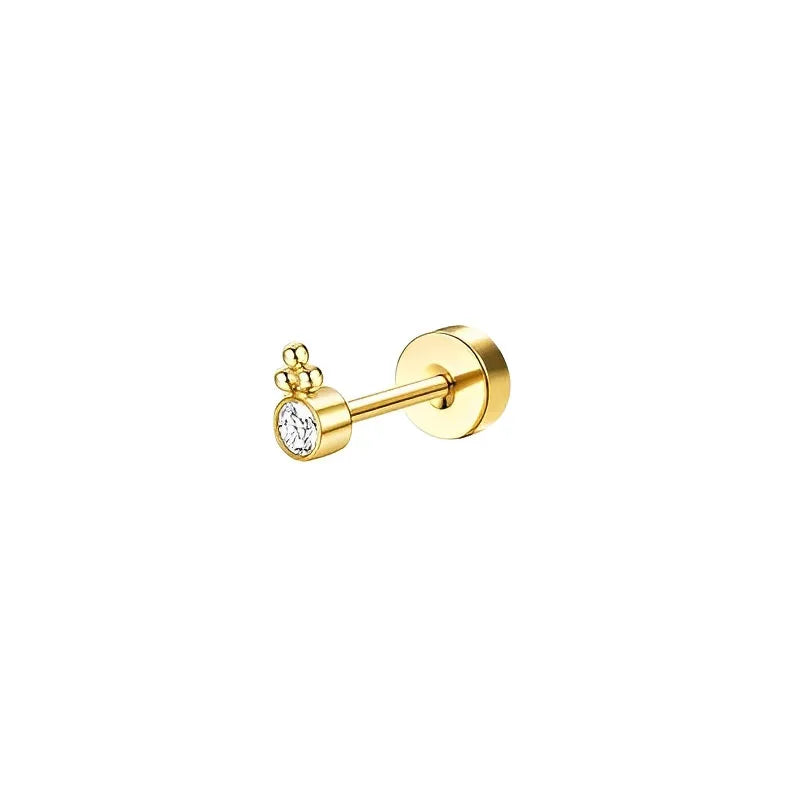 Gold earring with a small gemstone on a white background