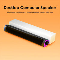 Desktop computer speaker with 9D surround stereo on an orange background