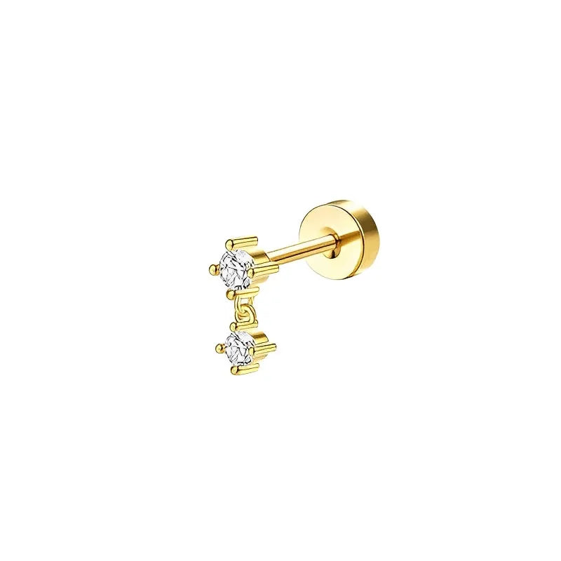 Gold earring with two clear gemstones on a white background