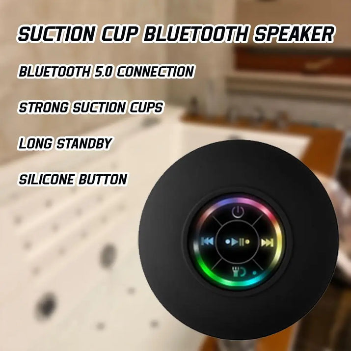 “Back view of portable Bluetooth speaker showing the suction cup attachment.”