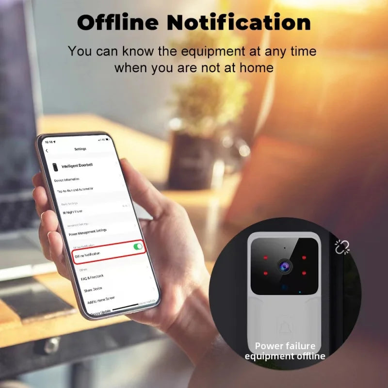 Hand holding a smartphone with an app interface, showing offline notification for equipment, with a blurred indoor background.