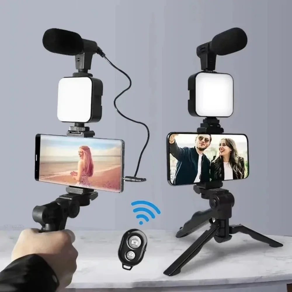 Phone holder with microphone and light on a stand, displaying smartphone screens.