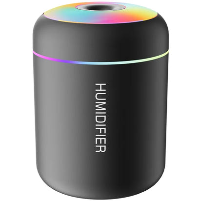 Mini air humidifier used in bedroom, office desk, and car for portable aromatherapy and moisture
