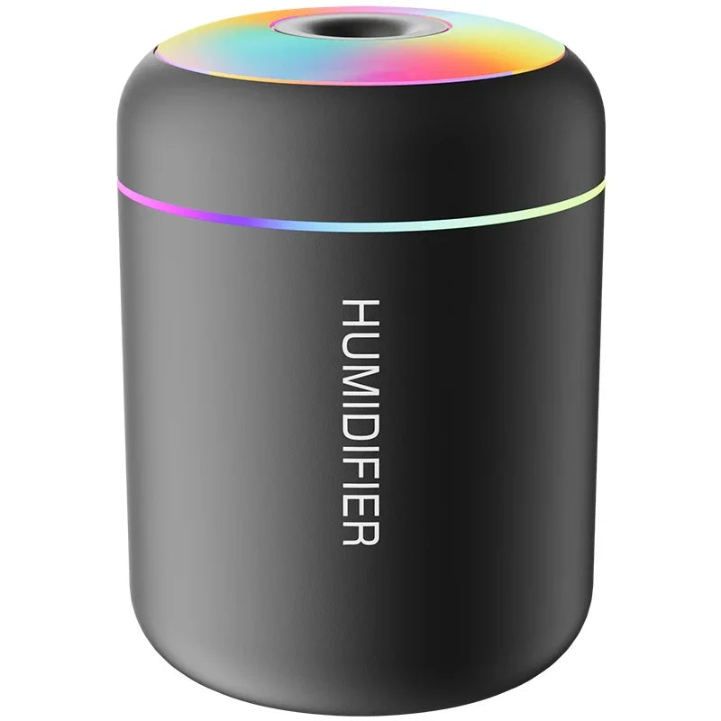 Mini air humidifier used in bedroom, office desk, and car for portable aromatherapy and moisture
