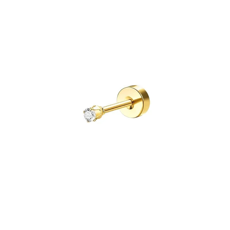 Gold earring with a clear gemstone on a white background