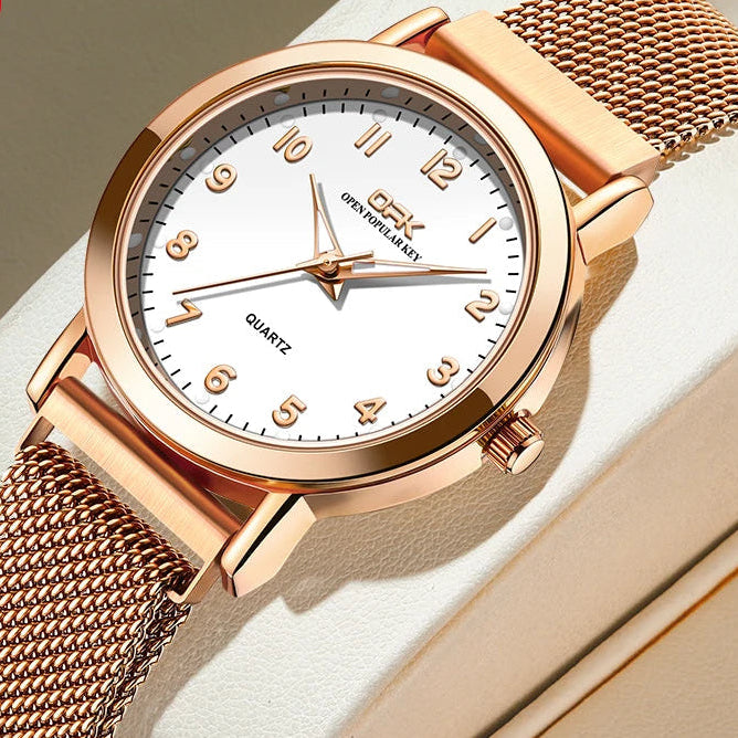 Rose gold round quartz watch with stainless steel mesh band