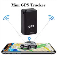 Mini GPS tracker with smartphone displaying a map and vehicle, on a white background