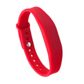 Red silicone wristband on a white background