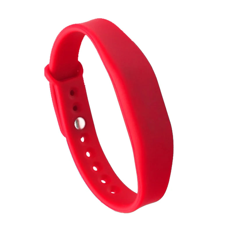 Red silicone wristband on a white background