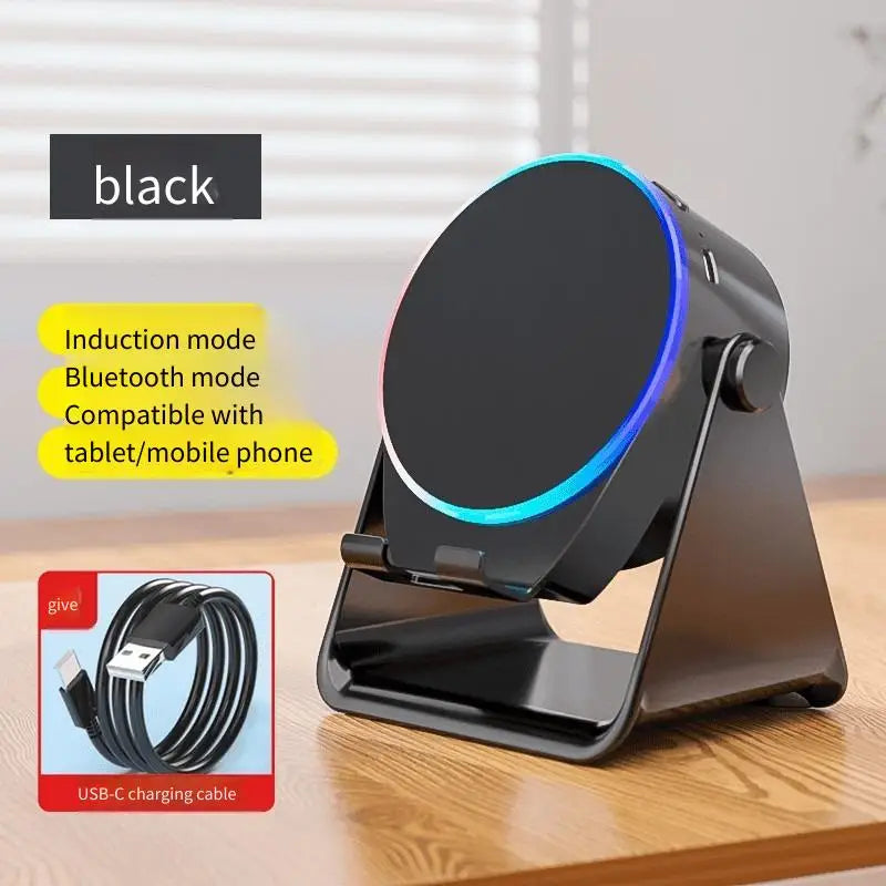 Black wireless charging stand with induction and Bluetooth mode on a wooden surface.