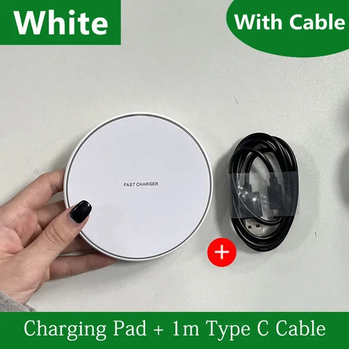 White charging pad with a black cable on a light gray background