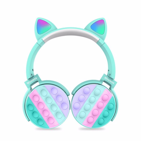 Turquoise wireless cat-ear headphones with pop-it fidgets ear pads for kids.